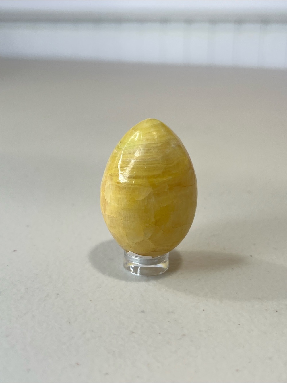 Yellow Polished banded Calcite Stone Egg Décor